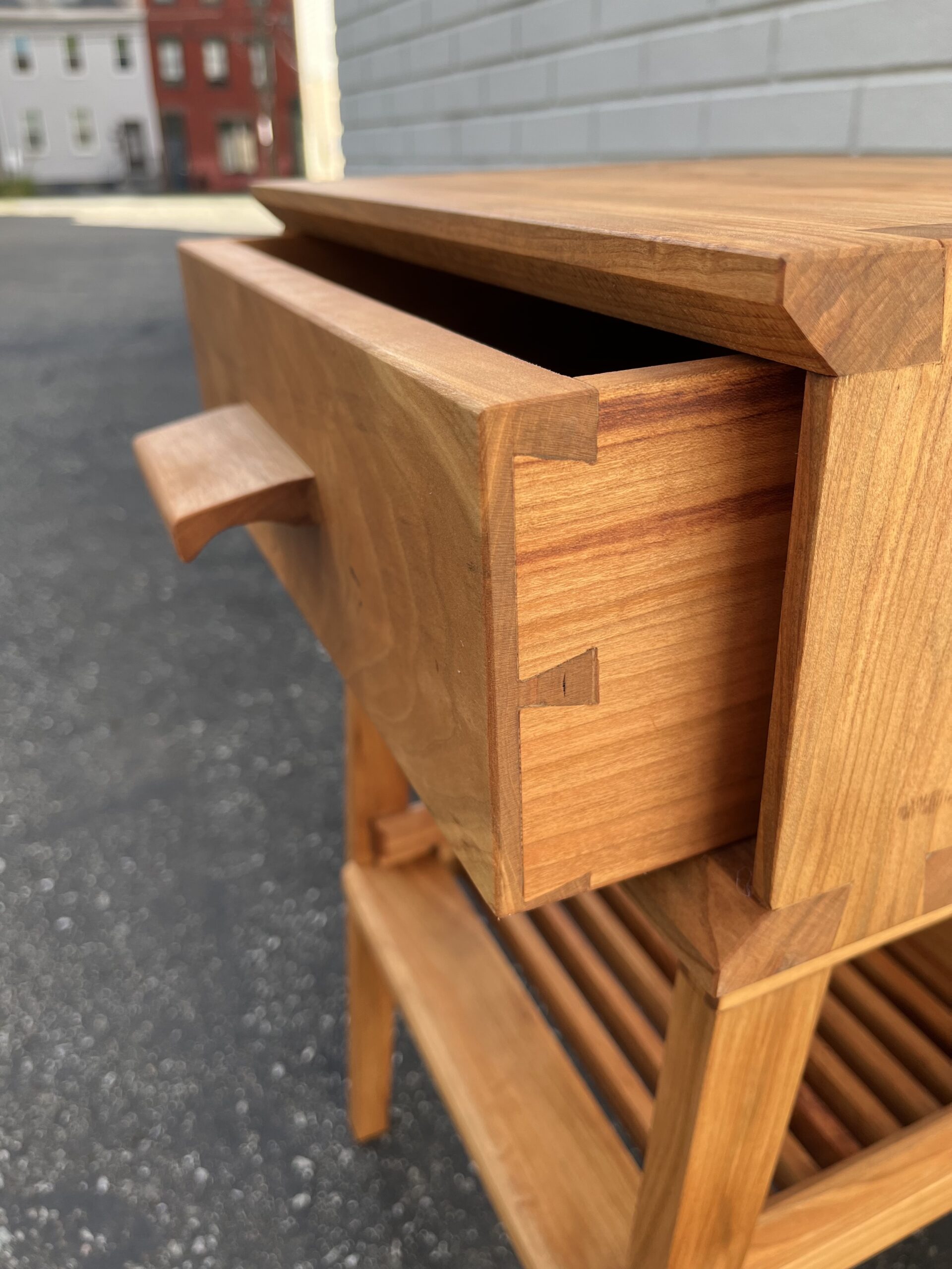 hand cut dovetailed drawer fitted with custom drawer pull